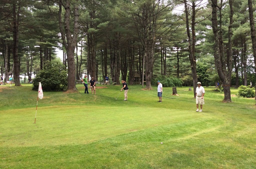 golfers enjoying a round on the green