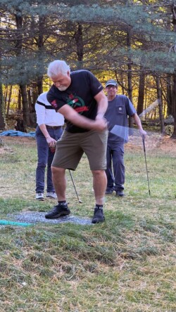 Mike mid-swing