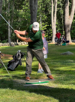 Player winds up for tee shot