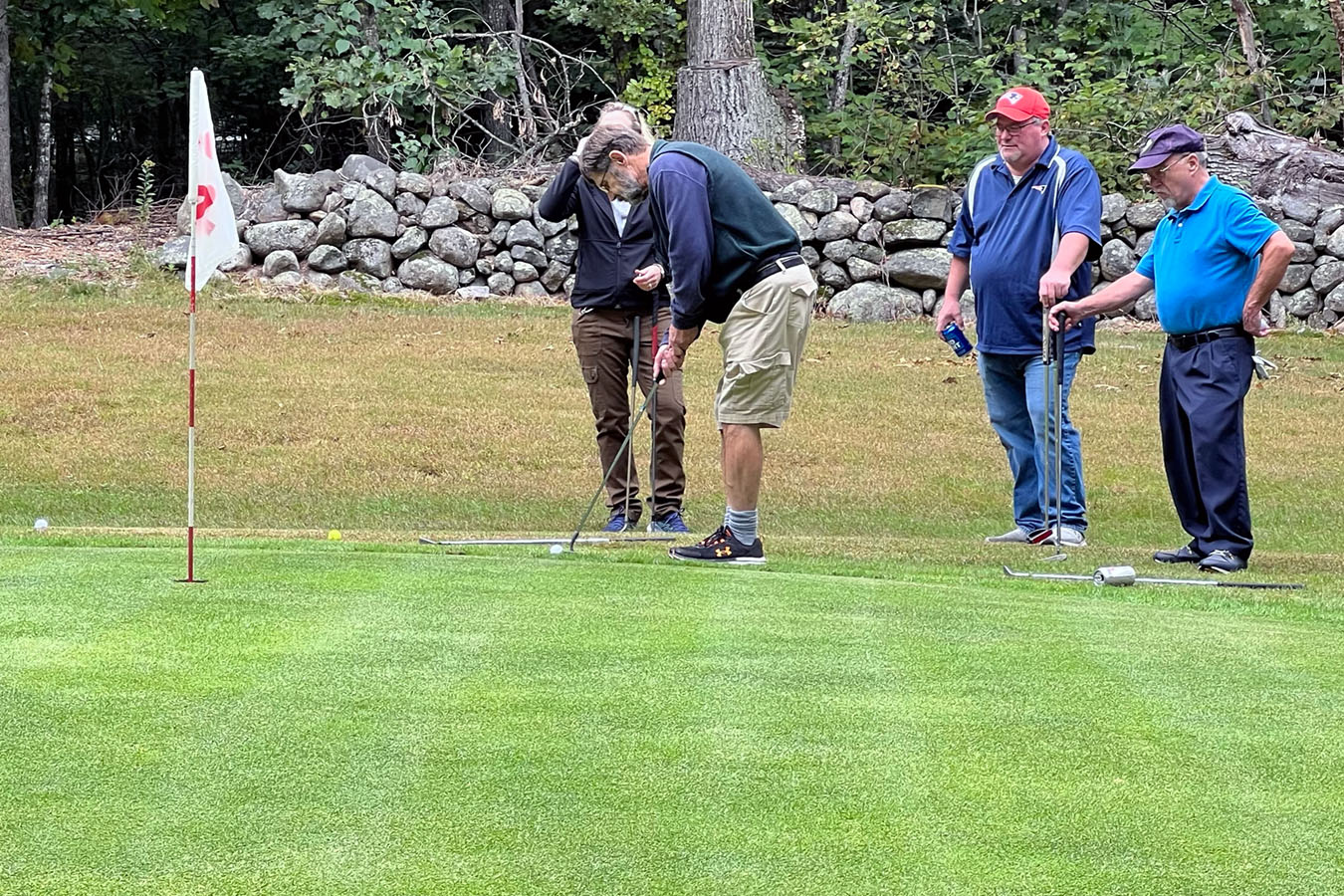 Chamber of Commerce Team chipping onto green