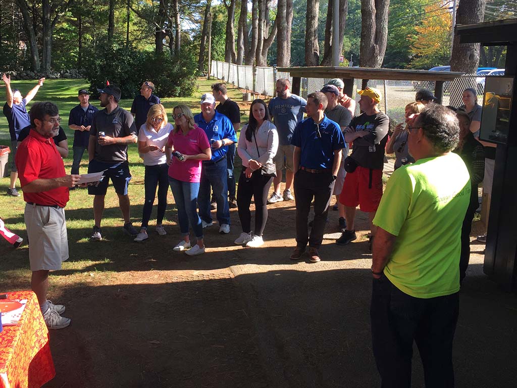 golf tournament participants await results